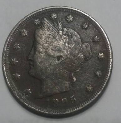 1895 Liberty Nickel die clash specimen showing transferred design elements from opposite die